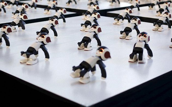 A hundred humanoid communication robots called Robi perform a synchronized dance during a promotional event called 100 Robi, for the Weekly Robi Magazine, in Tokyo, in this January 20, 2015 file photo. Three-fourths of robot installations over the next decade are expected to be concentrated in four areas: transportation equipment, including the automotive sector; computer and electronic products; electrical equipment and machinery. Labor costs have climbed in countries such as China that have been popular for outsourcing production, while technological advances for robots allow them to be more flexible and perform more tasks. REUTERS/Yuya Shino/Files ATTENTION EDITORS - THIS PICTURE IS PART OF THE PACKAGE "RISE OF THE MACHINES". TO FIND ALL 20 IMAGES SEARCH 'TECHNOLOGY ROBOTS'.